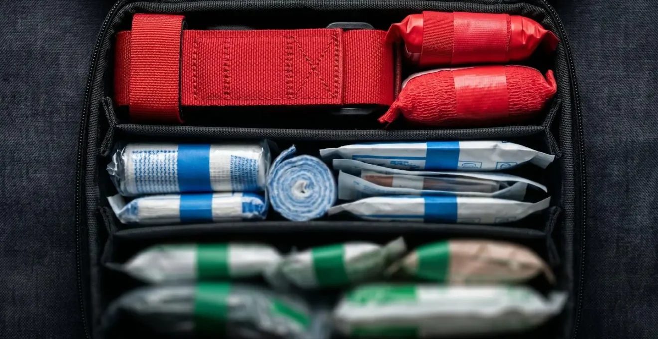 Layered first aid kit organization showing prioritized supplies by urgency