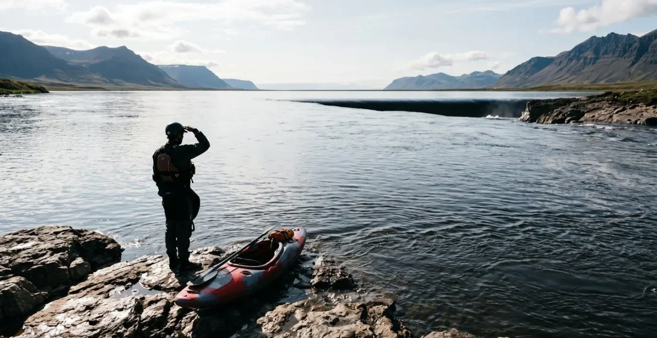 River view showing flat horizon line indicating drop ahead with kayaker on shore scouting